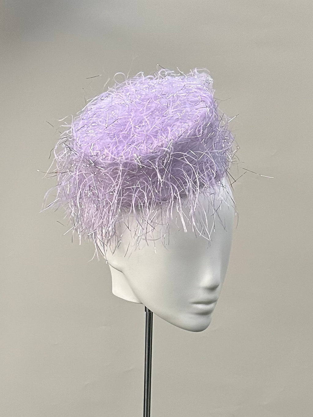 Frange di Luce soft lilac pillbox hat with a feathered texture and silver Lurex highlights