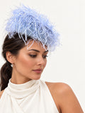 Model wearing the blue Frange di Luce textured pillbox hat