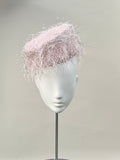 Frange di Luce blush pink pillbox hat with an angled silhouette and silver Lurex highlights