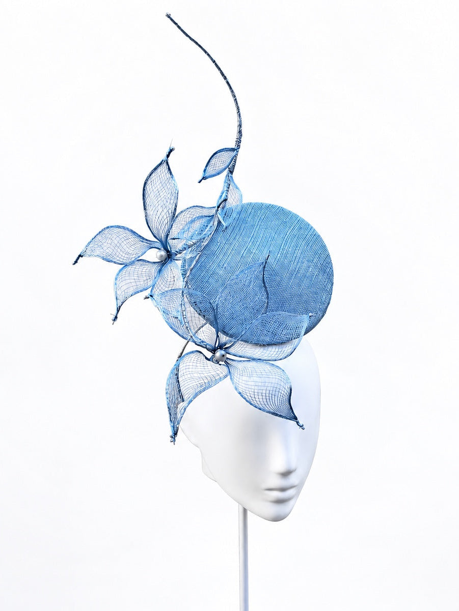 Le Jardin d’Avril pale blue floral percher on mannequin, angled view