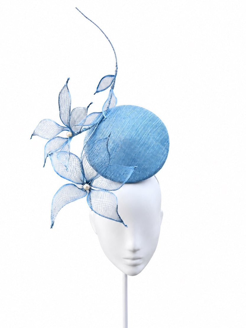 Le Jardin d’Avril pale blue floral percher on mannequin, front view