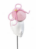 Makati pink sculptural beaded disc fascinator, angled view