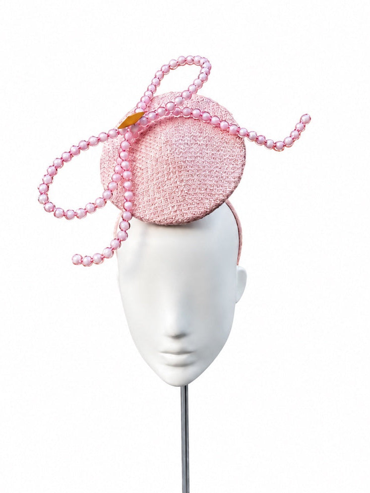 Makati pink sculptural beaded disc fascinator, front view