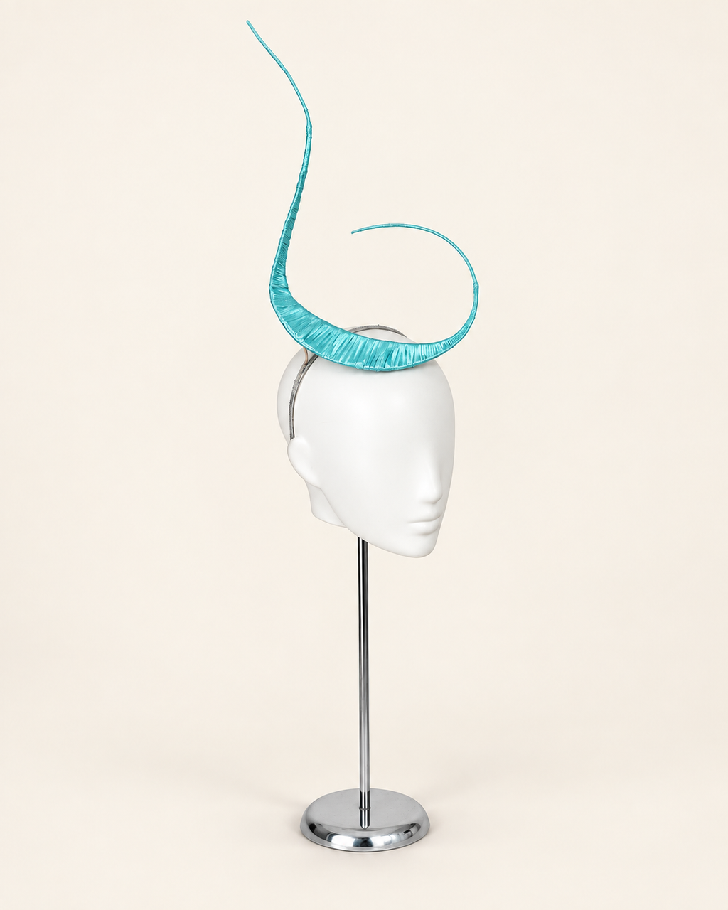 Polaris sculptural mast headpiece in aqua, three-quarter view