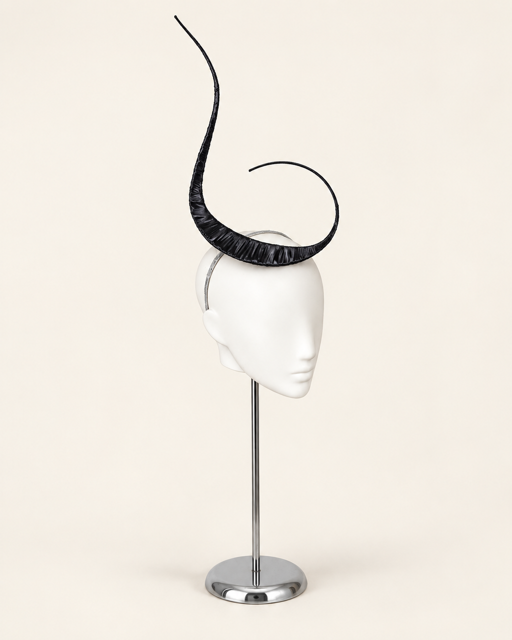 Polaris sculptural mast headpiece in black, three-quarter view