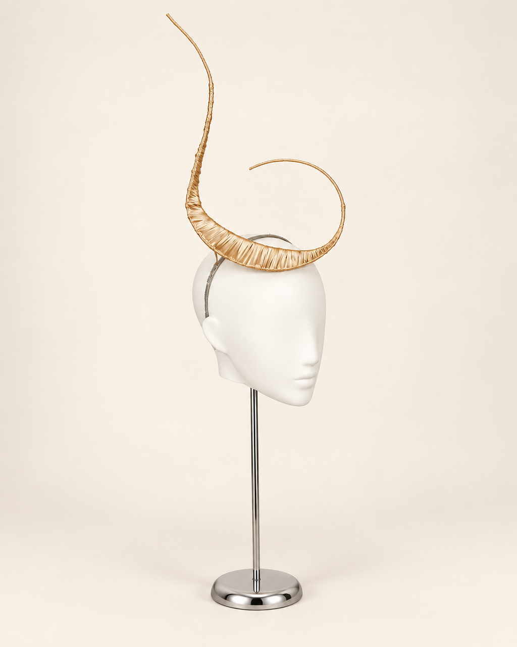 Polaris sculptural mast headpiece in metallic gold, three-quarter view