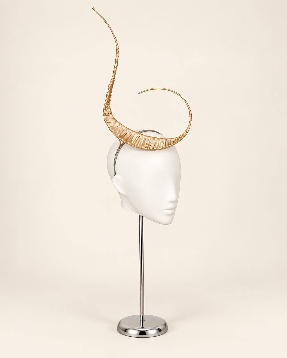 Polaris sculptural mast headpiece in metallic gold, three-quarter view