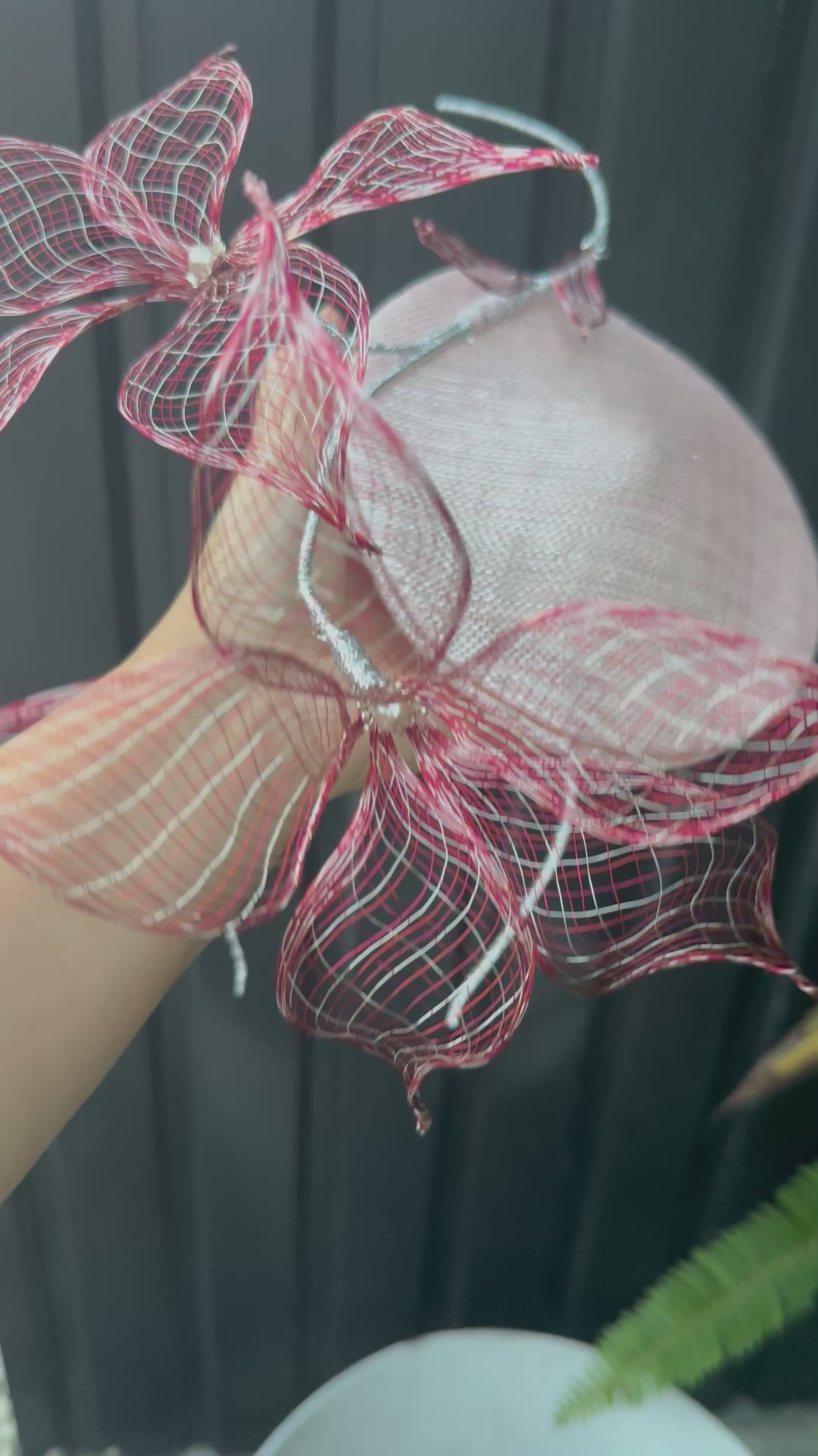 Video of the Le Jardin d’Avril pink, red and silver floral percher fascinator by Rachel Sañado