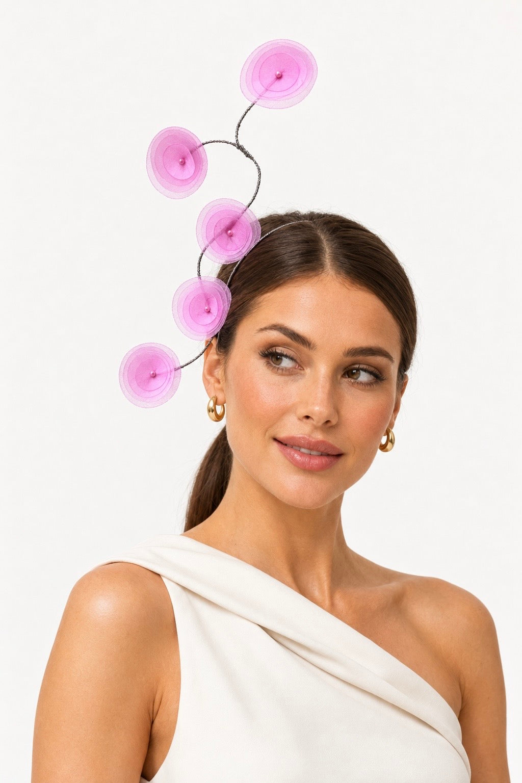 Ricordo di Positano pink organza floral headband worn by a model