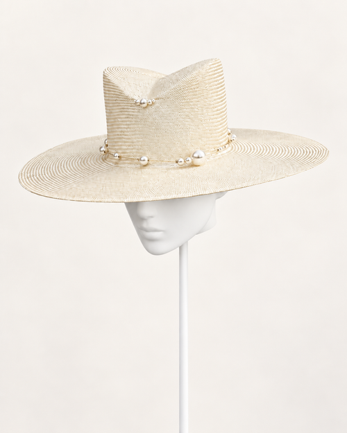 Bianco di Navagio — Pearl Wide-Brim Hat on a white mannequin and stand, view 2