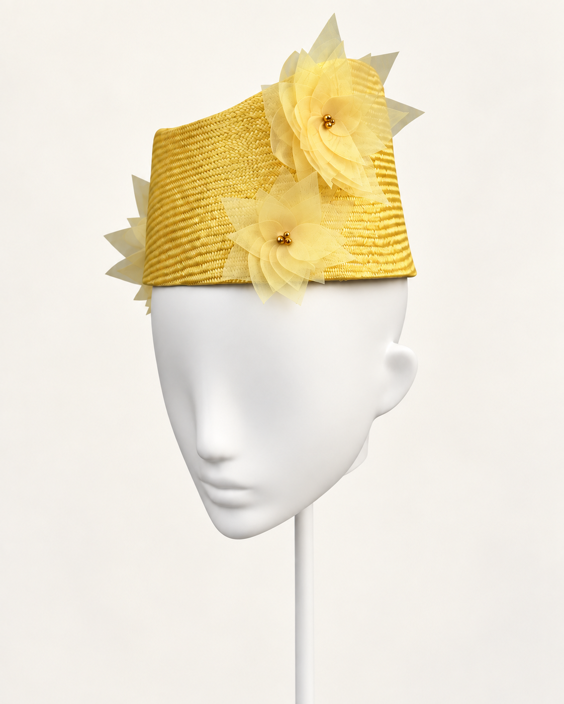 Verso Villasimius — Golden Floral Pillbox on a white mannequin and stand, view 2